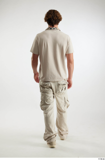 Lyle  1 back view beige cargo pants beige polo…